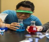 High school Boy and girl with science beakers